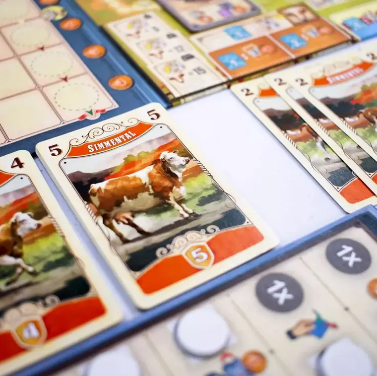 Cartas de ganado Simmental junto al tablero